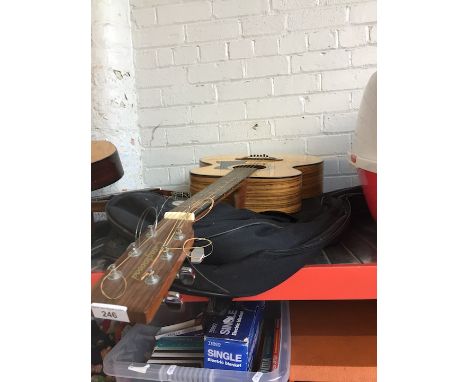 A Tanglewood TWOSJ steel strung acoustic guitar.