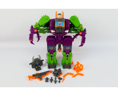 Transformers - A vintage unboxed Transformers Scorponok figure with some accessories. It shows some signs of age and use and 