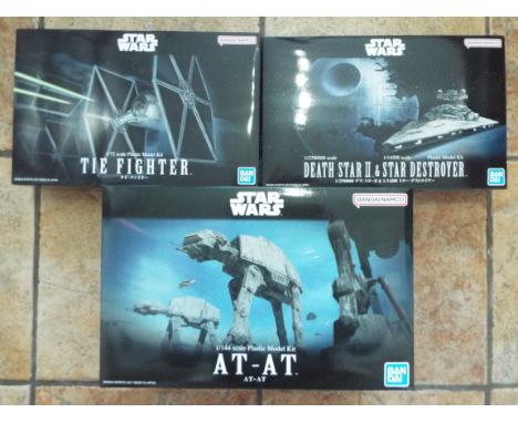 Bandai Star Wars -a trio of Star Wars Model Kits comprising 1:144 scale AT-AT # 5063846, 1:72 scale Tie Fighter # 5064104, an