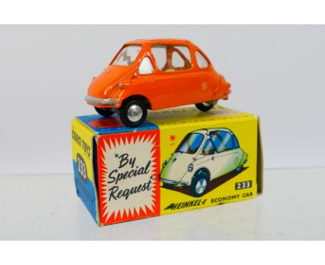 Corgi - A boxed Heinkel Bubble car in orange # 233. The model appears Mint in a Very Good box with light storage wear. (This 
