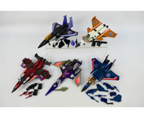 Transformers - A group of vintage Transformers including, Thrust, Skywarp, Cyclonus, and  Thundercracker. They show some sign