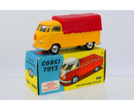 Corgi - A boxed Volkswagen Pick-Up in yellow with red tilt and the rarer lemon interior. # 431. The model appears Near Mint w