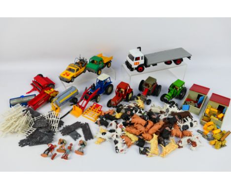 Britains - A collection of unboxed farm equipment and vehicles including Mercedes Unimog, Massey Ferguson 595 Tractor, Deutz 