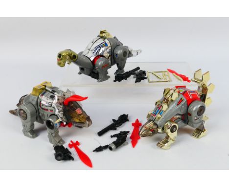 Transformers - 3 x vintage Dinobot Transformers, Sludge, Slag and Snarl. They show some signs of age and use and appear in Go