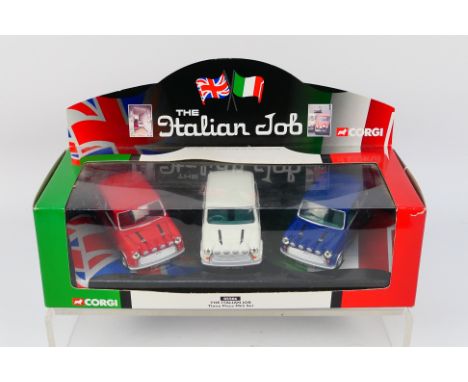 Corgi - A boxed 2002 dated The Italian Job set # 05506. The 3 x Mini models appear Mint in a Good box with some light storage