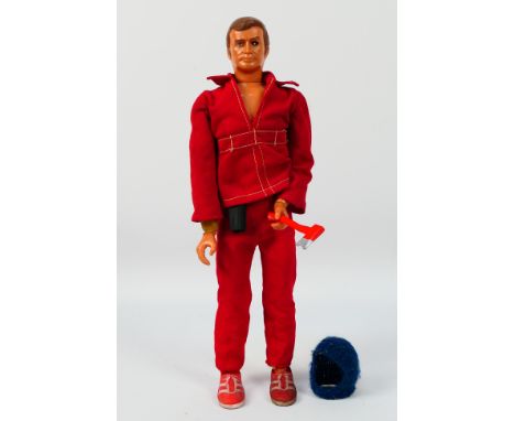 Denys Fisher - The Six Million Dollar Man - An unboxed Steve Austin figure with axe. He shows some signs of age and use and w