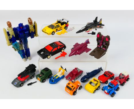 Transformers - A group of vintage Transformers including Triggerhappy, Sunstreaker, Runabout, Wildrider, Cliffjumper, Huffer,