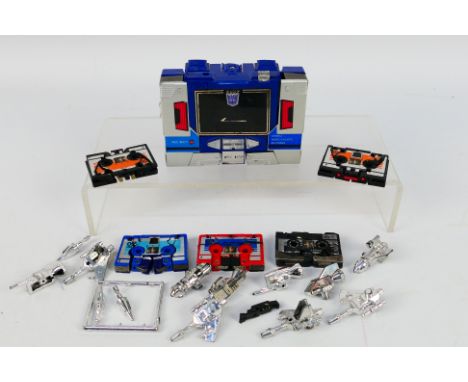 Transformers - A group of vintage Transformers, Soundwave, Frenzy, Laserbeak, Ravage and Rumble. They show some signs of age 