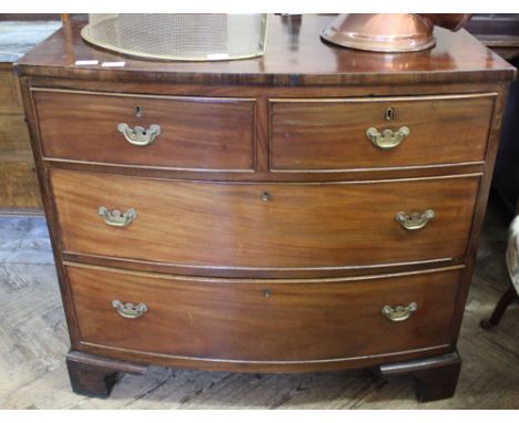A 19th Century bow front mahogany chest of two short and two long drawers