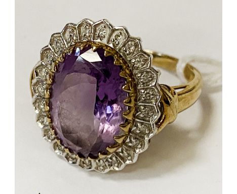 9CT GOLD OVAL AMETHYST RING WITH DIAMOND HALO SIZE N