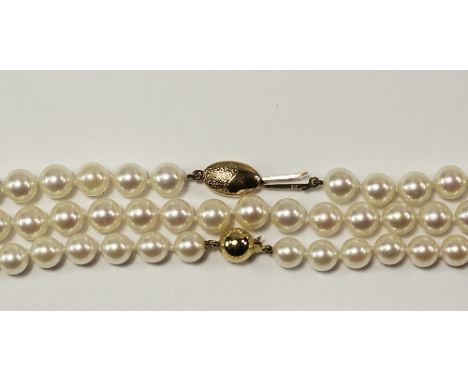 A cultured pearl necklace, with 9ct gold clasp, approx 67cm, together with two further culture pearl necklaces. (3)