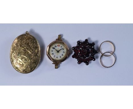 A 19th century garnet set brooch, or star form, approx 3.2cm diameter, together with a 9ct gold cased ladies wrist watch, two