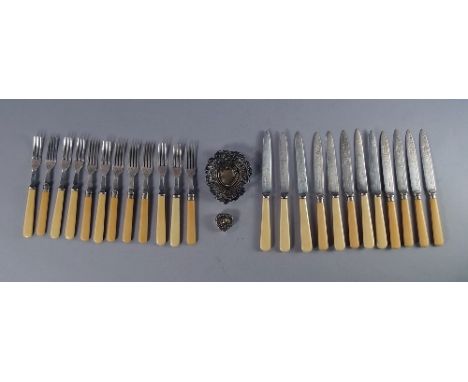 A set of twelve silver plated fish eaters with ivorine handles, together with a small silver pin tray, a heart shape box and 