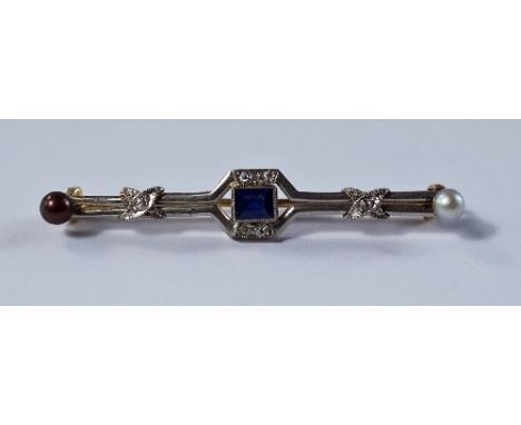 A sapphire, diamond and pearl bar brooch, c.1920s, the diamond set white metal bar with central oblong sapphire and a black a