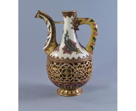A Continental pottery ewer, possibly by Zsolnay Pecs, late 19th/20th century, made for the Middle Eastern Market, the bulbous