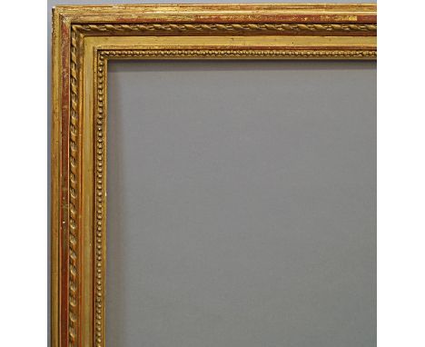 A Gilt Composition Louis XVI Style Frame, late 19th/early 20th century, with cavetto sight, pearl bead, taenia, frieze, ribbo