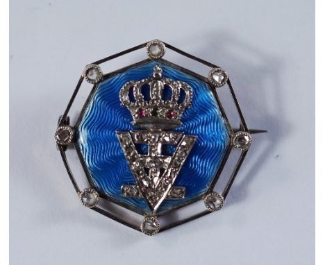 A white metal, enamel and diamond set brooch, early 20th century, of octagonal form, mine cut diamonds to the points, the cen