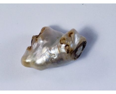 A large natural misshapen pearl, approx 38mm x 25mm. 