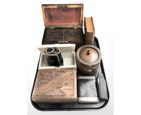 A Victorian mahogany tea caddy, box in the form of a book, rolled canvas bag containing silver thread and needles, hip flask 