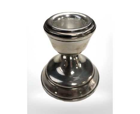 A loaded silver squat candlestick, Birmingham marks, height 6 cm.
