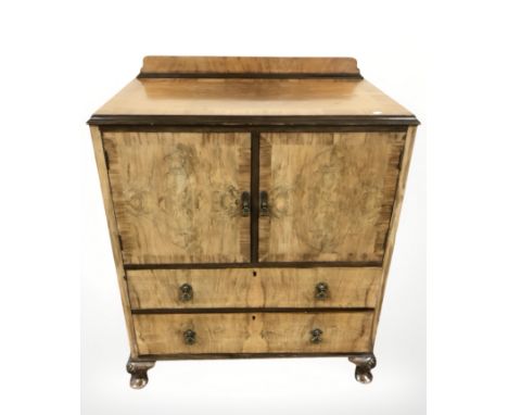 A 20th century burr walnut drinks cabinet, 84 cm x 52 cm x 103 cm.