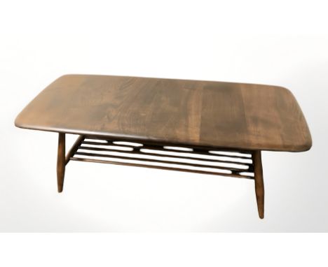 An Ercol stained elm coffee table, 106 cm long.