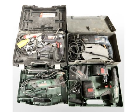 Four various boxed power tools, including Bosch.