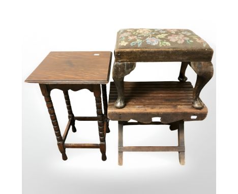 Two oak stools and a small lamp table.