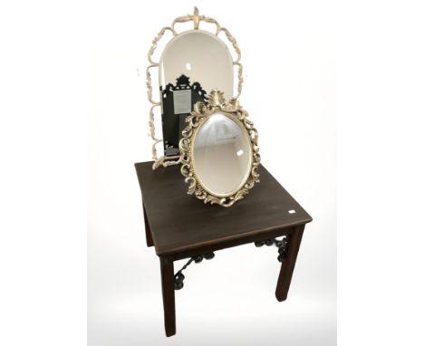 Two contemporary mirrors and a lamp table.