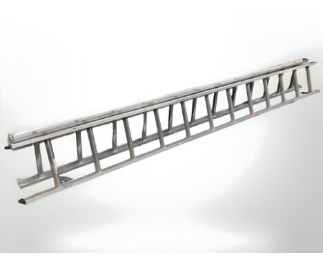 An aluminium double extension ladder, length 302 cm