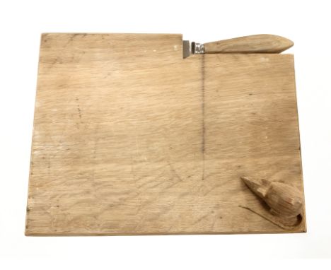 A Ben Oxley 'The Windsor Mouseman' oak cheese board, with carved mouse signature and incorporating a knife, width 23cm. 