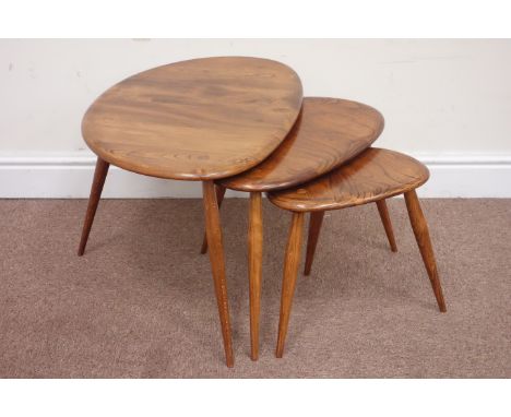 Ercol nest of three pebble elm top tables, raised on tapering legs, W66cm Condition Report Click here for further images, con