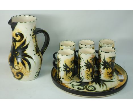 Celtic Pottery, Newlyn Cornwall, lemonade set, decorated with the phoenix pattern comprising of 6 mugs, jug and tray includin