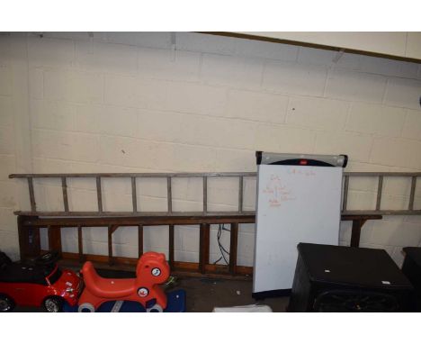 An aluminium ladder and a wooden stepladder