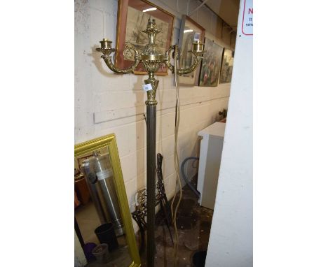 A three branch brass standard lamp