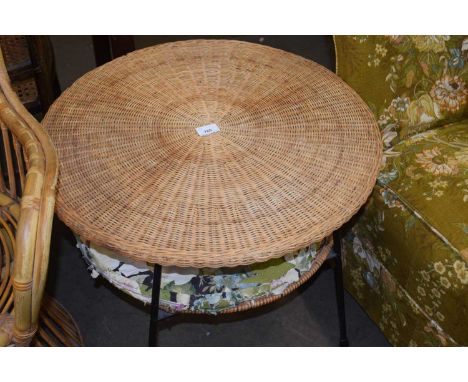 A retro wickerwork two tier lamp table