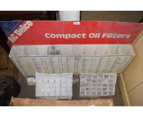 A display stand for A C Delco Compact Oil Filters and two others smaller