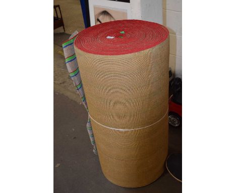 A roll of striped carpet