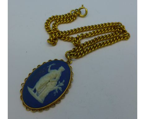 A 9ct gold mounted Wedgwood pendant on a plated chain