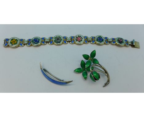 A Scandinavian silver and enamel bracelet, Einar Modahl and two silver and enamel brooches, one Norway and one Birmingham hal
