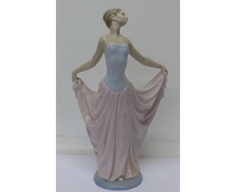 A Lladro figure of a lady, height 30cm