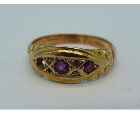 A 9ct gold and three stone ruby ring, one stone missing, 3.2g, R