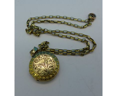 A plated locket on a 9ct gold chain