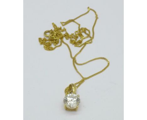 A 14ct gold and cubic zirconia pendant on a fine 14ct gold chain, 1.5g