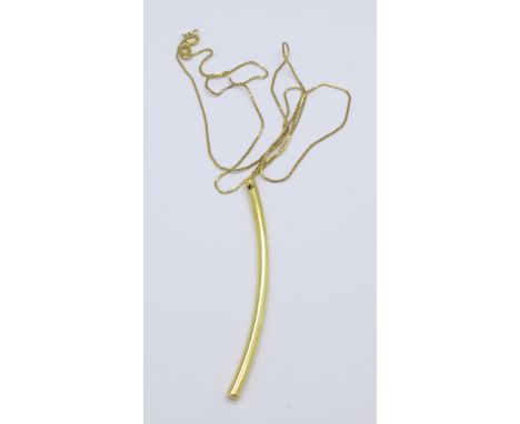 A 9ct gold chain with yellow metal pendant, 1.9g