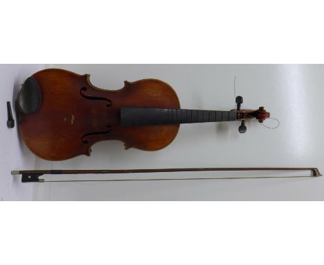 A violin with paper label, A. Stradivarius, Cremonensis, made in Czechoslovakia, back 36cm without button, with bow