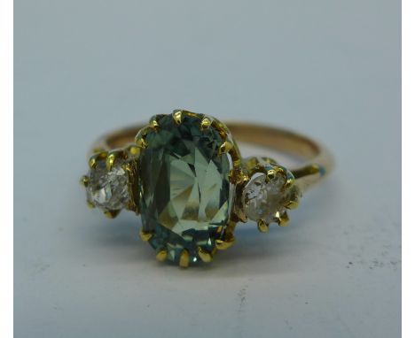 A yellow metal, three stone ring, 2.9g, K