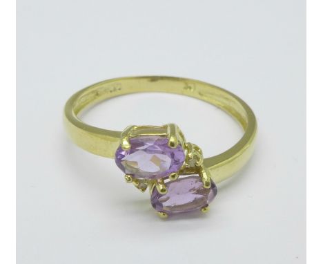 A 9ct gold, amethyst and diamond ring, 1.2g, O