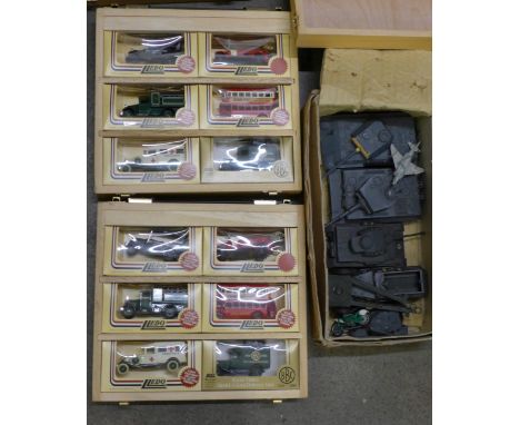 A collection of Solido model tanks and two cases of six boxed Lledo model cars