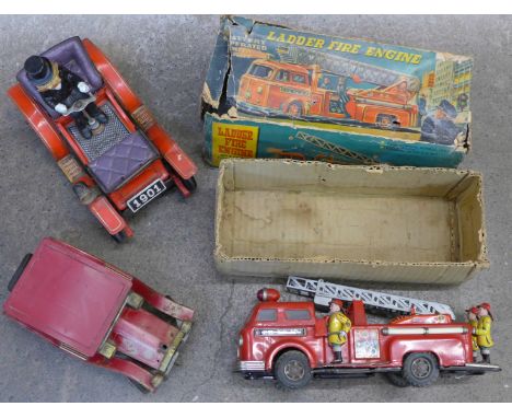 Two tin plate classic cars and a boxed Fire Engine, a/f